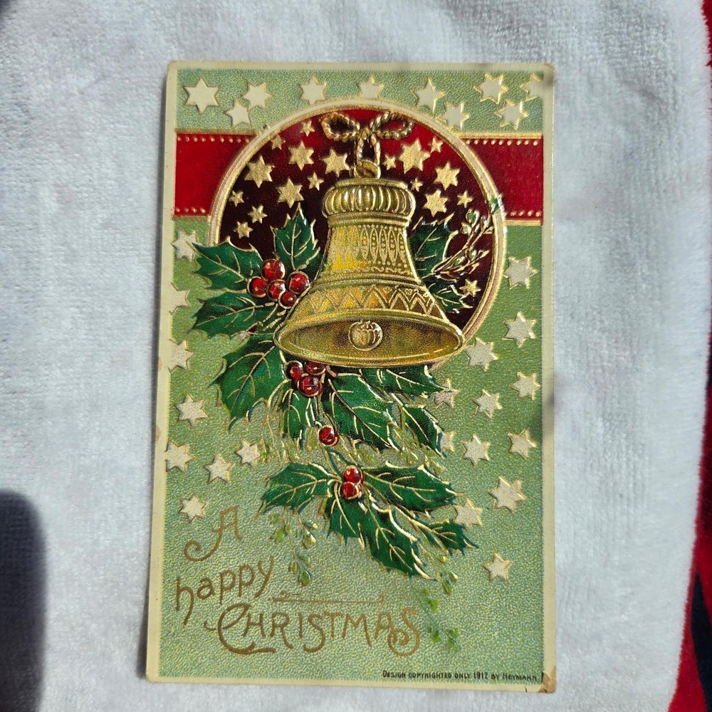 Antique 1912 Heymann Christmas Postcard Embossed Gold Bell Holly Stars Germany